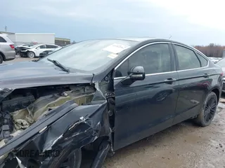 2015 Ford Fusion SE z VIN 3FA6P0H98FR273212, wystawiony jako IAAI lot #41952167 z przebiegiem 123 359 mil mil oraz . Historia ofert i sprzedaży dostępna na DreamBid. Obrazek 13.