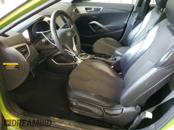 2012 Hyundai Veloster w/Black Int с VIN KMHTC6AD4CU044035, выставлен на аукционе Copart как лот 58576475 с пробегом 100 667 миль миль и Списание • Salvage title. История ставок и продаж доступна на DreamBid. Изображение 7.