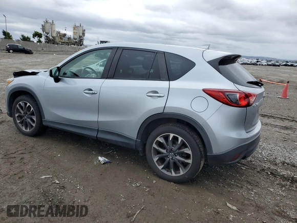 2016 Mazda CX-5 Grand Touring with VIN JM3KE2DY2G0894056, listed as a Copart auction lot 49247815 with 56,039 mi miles and Salvage Title. Bid and sale history available at carsss.com. Image 2.