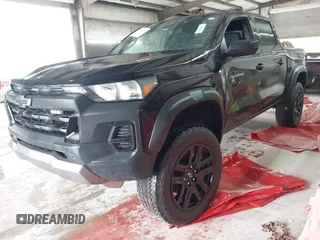 2023 Chevrolet Colorado 4WD Trail Boss with VIN 1GCPTEEK3P1261771, listed as a IAAI auction lot 42535710 with 30,000 mi miles and . Bid and sale history available at DreamBid. Image 2.