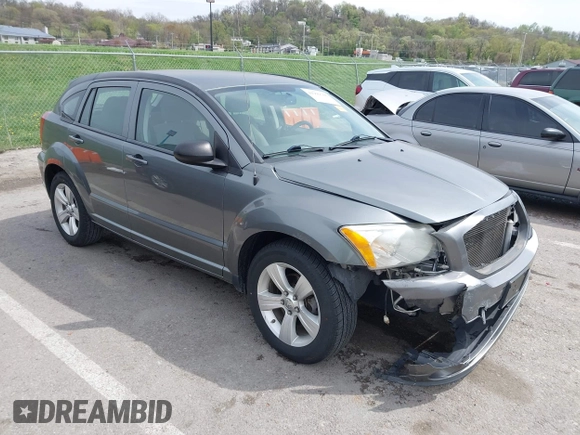 2012 Dodge Caliber SXT with VIN 1C3CDWDA6CD506019, listed as a IAAI auction lot 41999560 with 146,446 mi miles and . Bid and sale history available at DreamBid. Image 1.