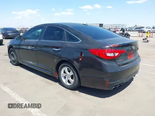 2015 Hyundai Sonata Sport with VIN 5NPE34ABXFH084893, listed as a IAAI auction lot 42066253 with 122,923 mi miles and . Bid and sale history available at carsss.com. Image 3.