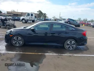 2016 Honda Civic Sedan EX-L with VIN 19XFC1F78GE201822, listed as a IAAI auction lot 41882529 with 142,589 mi miles. Bid and sale history available at carsss.com. Image 14.