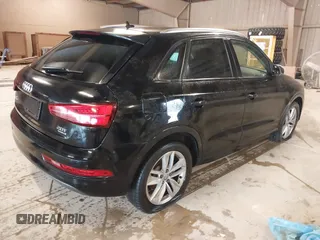 2017 Audi Q3 Premium z VIN WA1ECCFS3HR015665, wystawiony jako IAAI lot #42080113 z przebiegiem 142 149 mil mil oraz . Historia ofert i sprzedaży dostępna na DreamBid. Obrazek 4.
