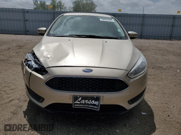 2017 Ford Focus SE with VIN 1FADP3F28HL299535, listed as a Copart auction lot 56958885 with 102,179 mi miles and Clean title. Bid and sale history available at DreamBid. Image 5.