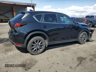 2018 Mazda CX-5 Touring with VIN JM3KFBCM4J0466234, listed as a Copart auction lot 51617095 with 58,200 mi miles and Salvage Title. Bid and sale history available at carsss.com. Image 3.