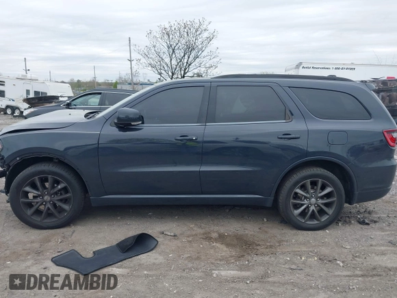 2018 Dodge Durango GT z VIN 1C4RDJDG3JC101378, wystawiony jako IAAI lot #42079593 z przebiegiem 107 023 mil mil oraz . Historia ofert i sprzedaży dostępna na DreamBid. Obrazek 13.
