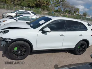 2014 Porsche Cayenne S z VIN WP1AB2A2XELA58986, wystawiony jako IAAI lot #41577501 z przebiegiem 53 672 mil mil oraz . Historia ofert i sprzedaży dostępna na DreamBid. Obrazek 14.