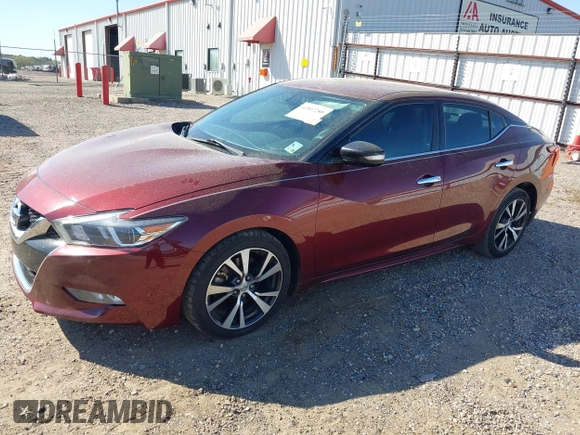 2016 Nissan Maxima Platinum z VIN 1N4AA6AP1GC416590, wystawiony jako IAAI lot #41817288 z przebiegiem 248 514 mil mil oraz . Historia ofert i sprzedaży dostępna na DreamBid. Obrazek 23.