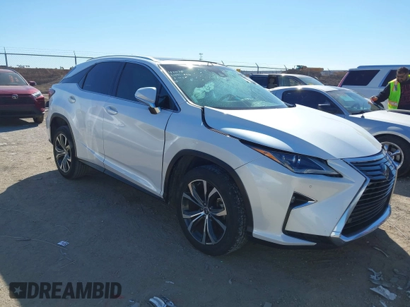 2018 Lexus RX 350 z VIN 2T2ZZMCAXJC106256, wystawiony jako IAAI lot #41658817 z przebiegiem 103 733 mil mil oraz . Historia ofert i sprzedaży dostępna na DreamBid. Obrazek 1.