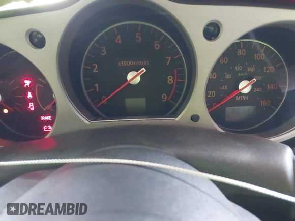 2008 Nissan 350Z z VIN JN1BZ34D98M705867, wystawiony jako IAAI lot #41871586 z przebiegiem 90 717 mil mil oraz . Historia ofert i sprzedaży dostępna na DreamBid. Obrazek 7.