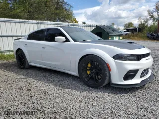 2020 Dodge Charger Scat Pack Widebody with VIN 2C3CDXGJ0LH240842, listed as a Copart auction lot 74261154 with 39,218 mi miles and Non Repairable. Bid and sale history available at carsss.com. Image 4.