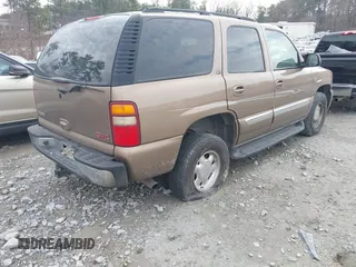 2003 GMC Yukon SLT with VIN 1GKEC13T73R126739, listed as a IAAI auction lot 41361906 with 166,748 mi miles. Bid and sale history available at carsss.com. Image 4.
