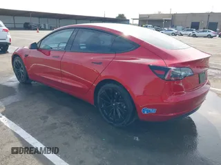 2021 Tesla Model 3 Long Range with VIN 5YJ3E1EB2MF015279, listed as a IAAI auction lot 41765428 with 55,486 mi miles. Bid and sale history available at carsss.com. Image 3.