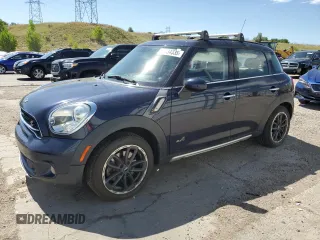 2016 MINI Countryman S with VIN WMWZC5C54GWT38489, listed as a Copart auction lot 63834335 with 102,564 mi miles and Salvage title. Bid and sale history available at DreamBid. Image 1.
