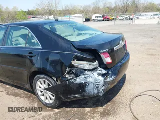 2010 Toyota Camry with VIN 4T1BF3EK5AU104363, listed as a IAAI auction lot 42075449 with 231,571 mi miles and . Bid and sale history available at DreamBid. Image 6.