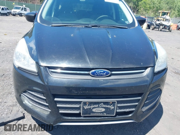 2014 Ford Escape SE with VIN 1FMCU9GX9EUA18422, listed as a IAAI auction lot 42765689 with 153,235 mi miles and . Bid and sale history available at DreamBid. Image 6.
