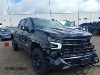 2024 Chevrolet Silverado 1500 LT Trail Boss with VIN 3GCUDFED0RG317306, listed as a IAAI auction lot 40318340 with 7,022 mi miles and . Bid and sale history available at DreamBid. Image 1.