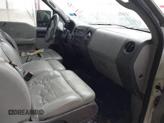 2007 Ford F-150 STX with VIN 1FTRX12W87FB37995, listed as a IAAI auction lot 42186007 with 228,249 mi miles and . Bid and sale history available at DreamBid. Image 5.