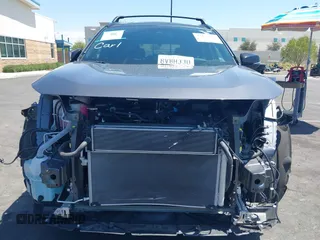 2021 Toyota RAV4 Hybrid XSE with VIN 2T3E6RFVXMW016803, listed as a IAAI auction lot 42135617 with 40,898 mi miles and . Bid and sale history available at DreamBid. Image 13.
