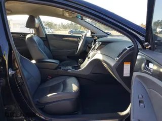 2013 Hyundai Sonata Hybrid Limited with VIN KMHEC4A40DA090333, listed as a IAAI auction lot 41479624 with 164,745 mi miles. Bid and sale history available at carsss.com. Image 5.