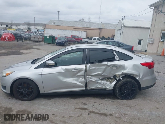2015 Ford Focus SE with VIN 1FADP3F29FL258781, listed as a IAAI auction lot 41963223 with 121,286 mi miles and . Bid and sale history available at DreamBid. Image 14.
