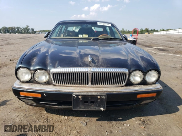1996 Jaguar XJ with VIN SAJKX6747TC764559, listed as a Copart auction lot 48501775 with Not provided miles and Salvage title. Bid and sale history available at DreamBid. Image 5.