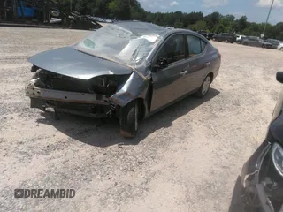 2012 Nissan Versa SV with VIN 3N1CN7AP1CL811531, listed as a IAAI auction lot 40465017 with 173,736 mi miles and . Bid and sale history available at DreamBid. Image 2.