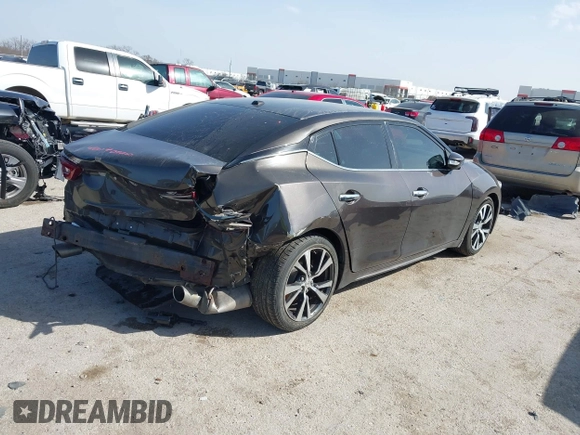 2016 Nissan Maxima Platinum with VIN 1N4AA6AP2GC385723, listed as a IAAI auction lot 41753328 with 162,845 mi miles and . Bid and sale history available at DreamBid. Image 4.