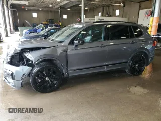 2021 Volkswagen Tiguan SE z VIN 3VV2B7AXXMM143811, wystawiony jako Copart lot #64605945 z przebiegiem 55 991 mil mil oraz Szkoda całkowita • Salvage title. Historia ofert i sprzedaży dostępna na DreamBid. Obrazek 1.