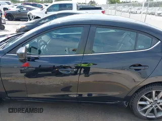 2018 Mazda 3 Touring with VIN 3MZBN1V32JM208914, listed as a IAAI auction lot 42066757 with 111,249 mi miles and . Bid and sale history available at DreamBid. Image 14.