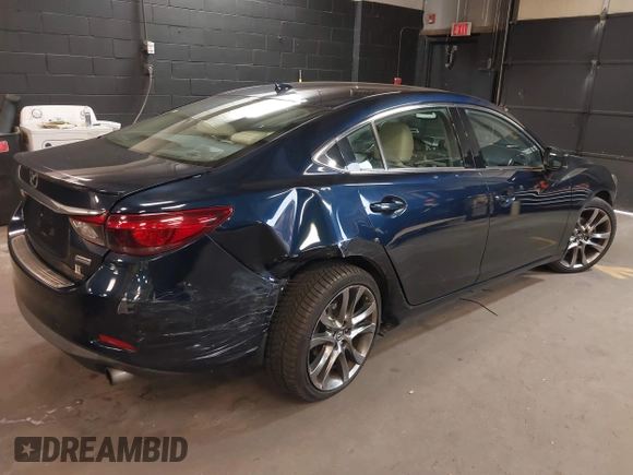 2017 Mazda 6 Grand Touring with VIN JM1GL1W51H1101519, listed as a IAAI auction lot 42132215 with 145,796 mi miles. Bid and sale history available at carsss.com. Image 4.