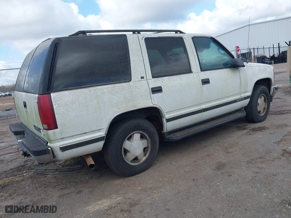 1996 Chevrolet Tahoe with VIN 1GNEK13R9TJ409605, listed as a IAAI auction lot 41467333 with 209,356 mi miles. Bid and sale history available at carsss.com. Image 4.