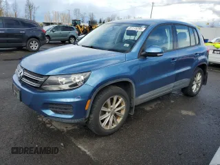 2017 Volkswagen Tiguan S with VIN WVGBV7AX1HK052098, listed as a Copart auction lot 51115295 with 53,906 mi miles and Salvage Title. Bid and sale history available at DreamBid. Image 1.