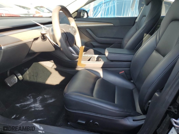 2022 Tesla Model 3 with VIN 5YJ3E1EA9NF332355, listed as a Copart auction lot 46068405 with 58,049 mi miles and Salvage Title. Bid and sale history available at carsss.com. Image 7.