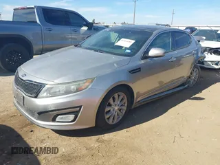 2014 Kia Optima EX z VIN 5XXGN4A74EG260054, wystawiony jako IAAI lot #41464688 z przebiegiem 40 498 mil mil oraz . Historia ofert i sprzedaży dostępna na DreamBid. Obrazek 17.