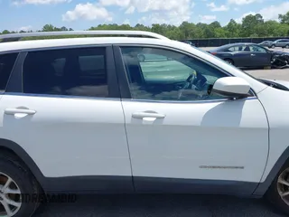 2016 Jeep Cherokee Latitude with VIN 1C4PJLCB0GW291357, listed as a IAAI auction lot 42312356 with 105,692 mi miles and . Bid and sale history available at DreamBid. Image 19.