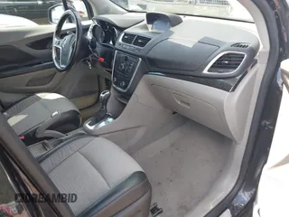 2016 Buick Encore with VIN KL4CJASB8GB662304, listed as a IAAI auction lot 38431076 with 118,383 mi miles. Bid and sale history available at carsss.com. Image 5.