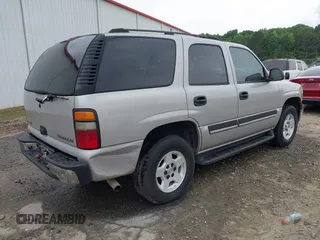 2004 Chevrolet Tahoe LT z VIN 1GNEC13Z24J220275, wystawiony jako IAAI lot #42142833 z przebiegiem 271 725 mil mil oraz . Historia ofert i sprzedaży dostępna na DreamBid. Obrazek 4.