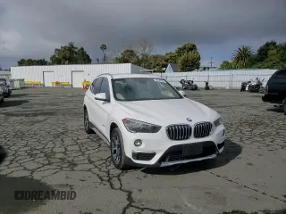 2017 BMW X1 sDrive28i with VIN WBXHU7C33H5H32827, listed as a Copart auction lot 50348265 with 117,412 mi miles and Salvage Title. Bid and sale history available at carsss.com. Image 12.