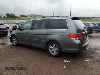 2010 Honda Odyssey Touring с VIN 5FNRL3H92AB114278, выставлен на аукционе Copart как лот 61245465 с пробегом 186 733 миль миль и Чистый • Clean title. История ставок и продаж доступна на DreamBid. Изображение 2.