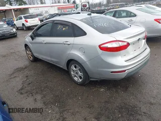 2015 Ford Fiesta SE with VIN 3FADP4BJ7FM136387, listed as a IAAI auction lot 41671370 with 181,973 mi miles. Bid and sale history available at carsss.com. Image 3.