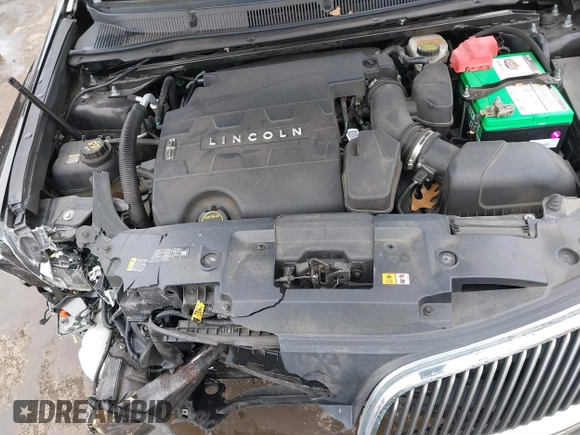 2014 Lincoln MKS with VIN 1LNHL9EK7EG609329, listed as a IAAI auction lot 41555819 with 89,849 mi miles. Bid and sale history available at carsss.com. Image 10.