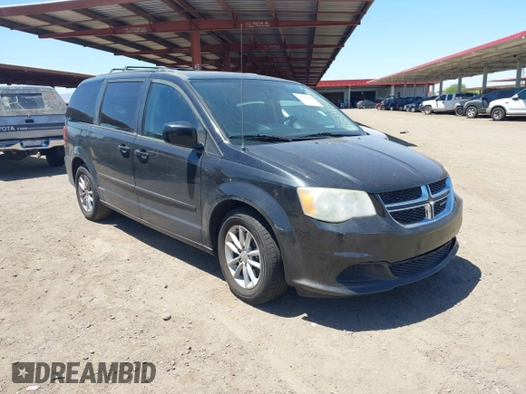 2014 Dodge Grand Caravan SXT with VIN 2C4RDGCG7ER265931, listed as a IAAI auction lot 42141644 with 205,968 mi miles and . Bid and sale history available at DreamBid. Image 1.