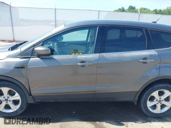 2013 Ford Escape SE with VIN 1FMCU0G92DUD71645, listed as a IAAI auction lot 42638354 with 112,128 mi miles and . Bid and sale history available at DreamBid. Image 14.