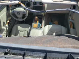 2005 Cadillac XLR z VIN 1G6YV34A955600330, wystawiony jako Copart lot #76173224 z przebiegiem Nie podano mil oraz Szkody całkowita. Historia ofert i sprzedaży dostępna na DreamBid. Obrazek 8.
