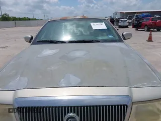 2004 Mercury Grand Marquis LS Premium z VIN 2MEFM75WX4X607033, wystawiony jako IAAI lot #42332543 z przebiegiem 179 297 mil mil oraz . Historia ofert i sprzedaży dostępna na DreamBid. Obrazek 6.