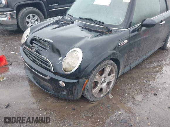 2006 MINI Convertible S with VIN WMWRH33516TF86823, listed as a IAAI auction lot 42184059 with Not Provided miles and . Bid and sale history available at DreamBid. Image 6.