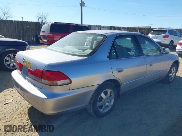 2002 Honda Accord EX z VIN 1HGCG56542A144609, wystawiony jako IAAI lot #41706668 z przebiegiem 220 536 mil mil oraz . Historia ofert i sprzedaży dostępna na DreamBid. Obrazek 4.