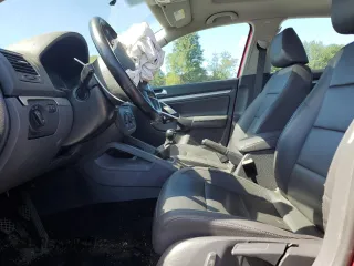 2009 Volkswagen Jetta SE with VIN 3VWRZ71K69M177746, listed as a Copart auction lot 70990074 with 128,390 mi miles and Salvage title. Bid and sale history available at DreamBid. Image 7.